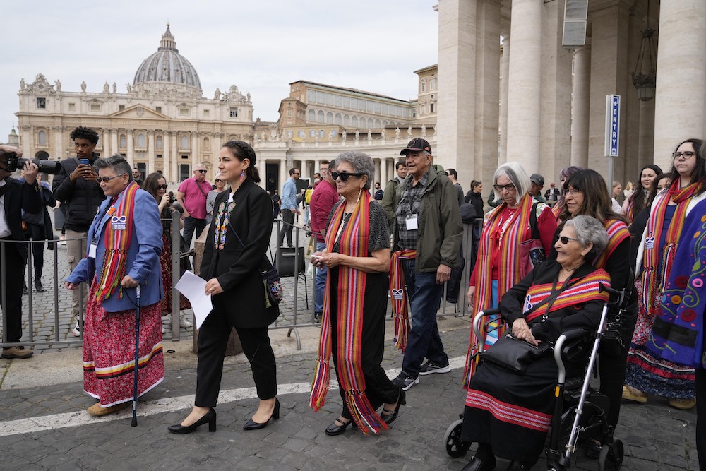 A group of six women and one man leaving a building in Rome
